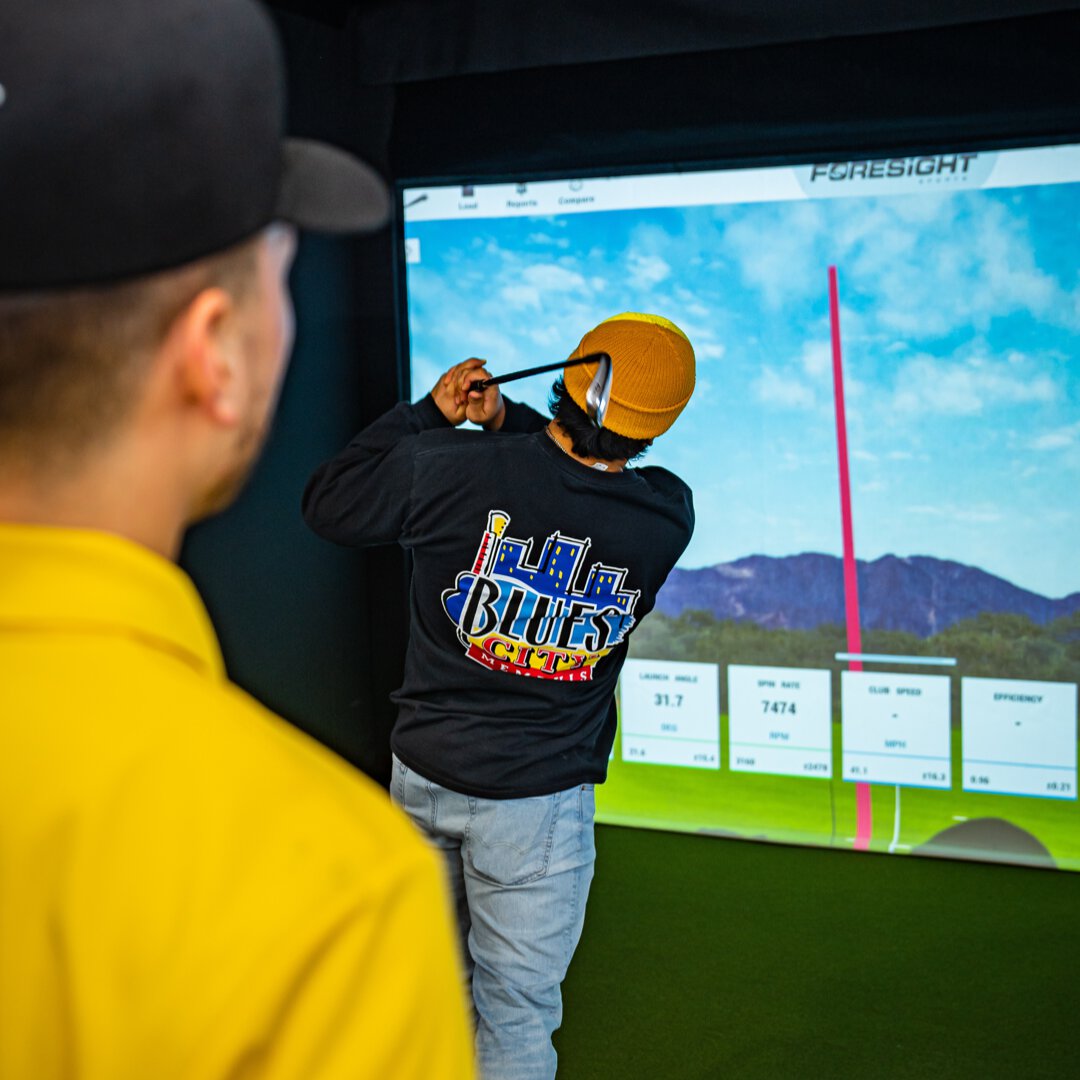 London Golf instructor teaching a man a golf lesson in London, Ontario